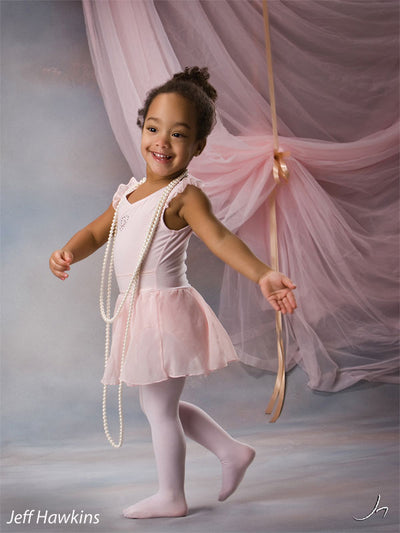 Softly layered background with faint tree detail and balanced natural color.