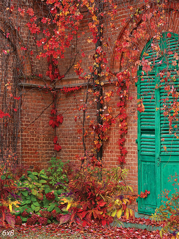 Autumn Garden Brick Wall Photography Backdrop - Photography backdrop featuring a rustic brick wall with cascading autumn vines and a green door, ideal for seasonal photoshoots.