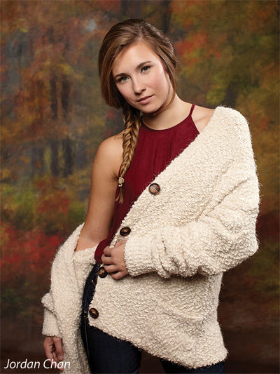 Rich fall scene with golden yellows, deep reds, and painterly tree textures.