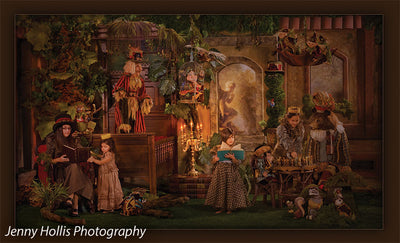 Painterly garden with stone cherubs and timeless texture, ideal for dramatic portraiture.