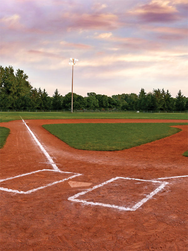 Baseball Diamond Photography Backdrop - Photography backdrop of a baseball diamond featuring home plate, infield clay, green outfield, and evening sky for sports-themed photoshoots.