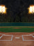 Baseball Field Photography Backdrop - A lit-up baseball field photography backdrop featuring stadium lights and a detailed baseball diamond.