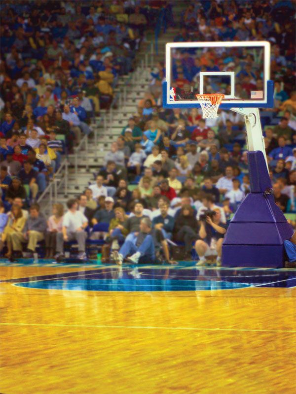 A basketball photography backdrop featuring a realistic game-time court with a hoop and stadium crowd.