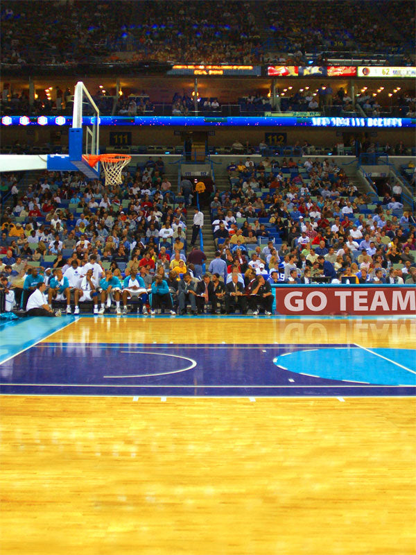 A professional basketball photography backdrop featuring a three-point court view with a lively stadium crowd and a game-day atmosphere.
