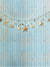 Beach-Themed Seashell & Starfish Photography Backdrop - Beach-themed seashell and starfish photography backdrop with light blue wood planks and garland for kid-friendly summer photoshoots.