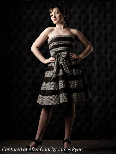 Portrait backdrop with dramatic black diamond tuft pattern.