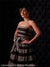 Stylish black tufted backdrop perfect for fashion and editorial shoots.