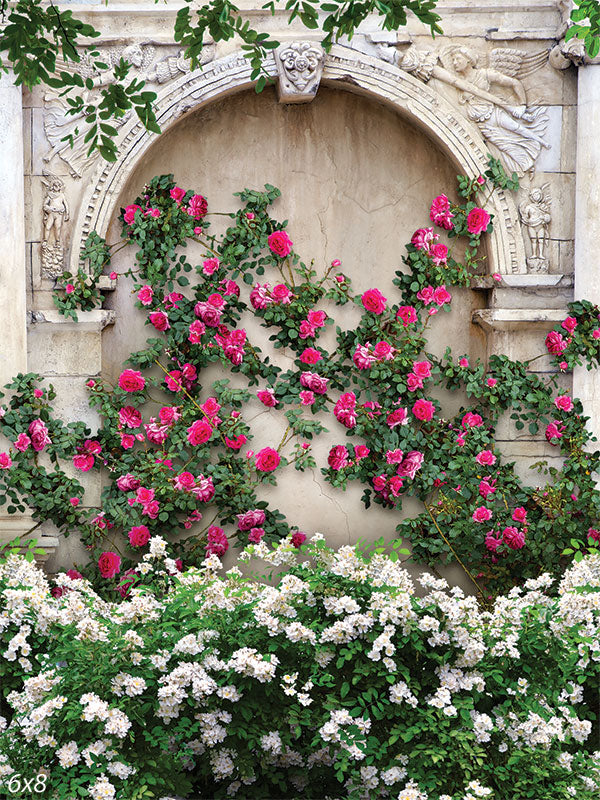 Blooming Stone Archway Photography Backdrop - A carved stone archway adorned with vibrant climbing roses and lush white flowers, perfect as a photography backdrop.