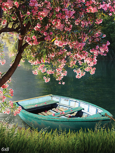 Blossom by the Lake Photography Backdrop - Serene lakeside photography backdrop featuring a vintage wooden boat and pink blossoming tree.