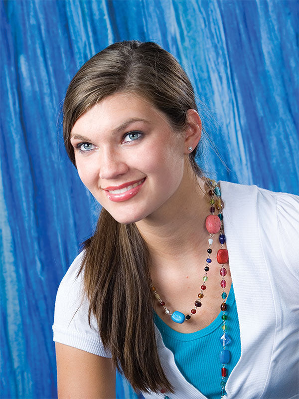Bright blue textured backdrop perfect for portrait and senior photographers