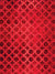 Bold red photography backdrop with a repeating circle pattern, ideal for professional and creative portrait sessions.