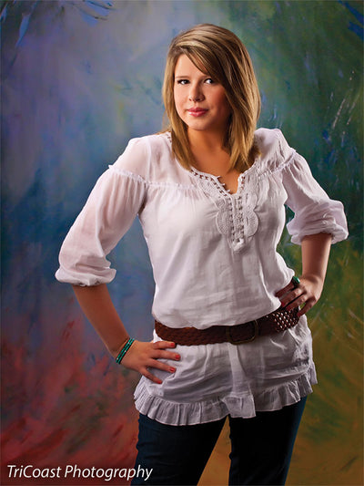 Mix of color and light in a high-contrast, artistic brush pattern.