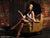 Studio backdrop with aged wooden door and cracked plaster.