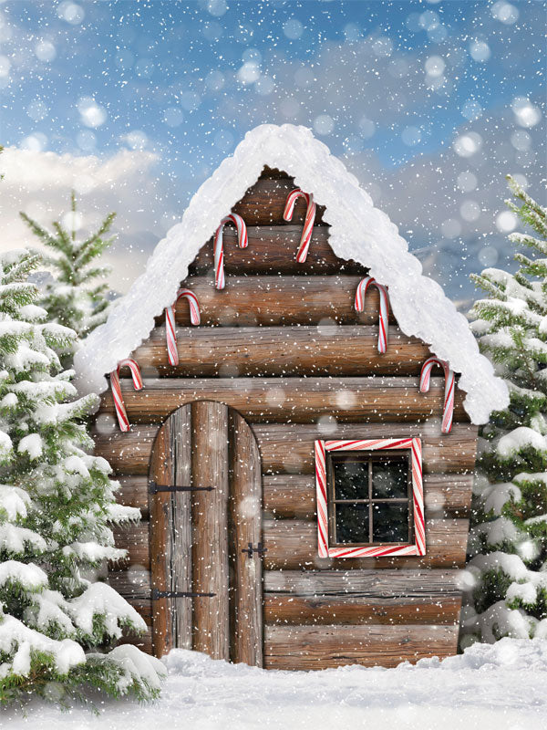 Candy Cane Cabin Winter Photography Backdrop - A festive log cabin decorated with candy canes surrounded by snow-covered trees, perfect for Christmas and winter-themed photography.