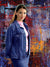 Vibrant red, blue, and yellow textured photography backdrop used for stylish portrait photography and bold senior photo sessions.
