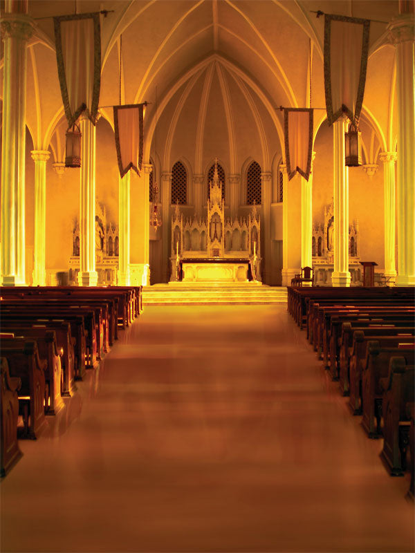 A majestic cathedral photography backdrop with glowing golden light and Gothic architectural details, perfect for wedding and religious portraits.