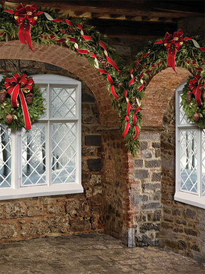 Christmas Window Arch Photography Backdrop - Christmas-themed photography backdrop featuring a stone archway with holiday garlands and a snowy window scene.