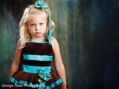 Backdrop with dramatic brushstroke flow in dark artistic tones.