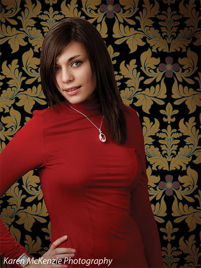 Elegant gold damask design with floral accents and bold contrast.