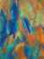 Artistic studio backdrop with blended teal, orange, and blue brushstrokes.