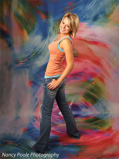 Energetic studio backdrop featuring dynamic swirls of vivid color.