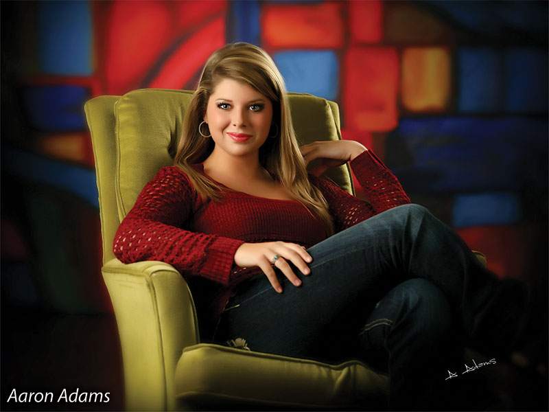 Artistic studio backdrop with expressive blocks and arched brushwork.