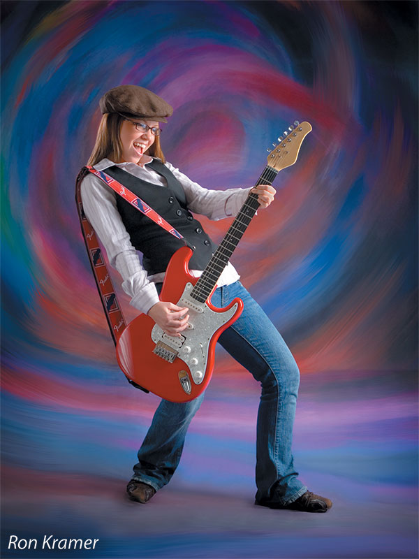 Intense swirl of multicolor brushstrokes creating a vivid, dynamic photo background.