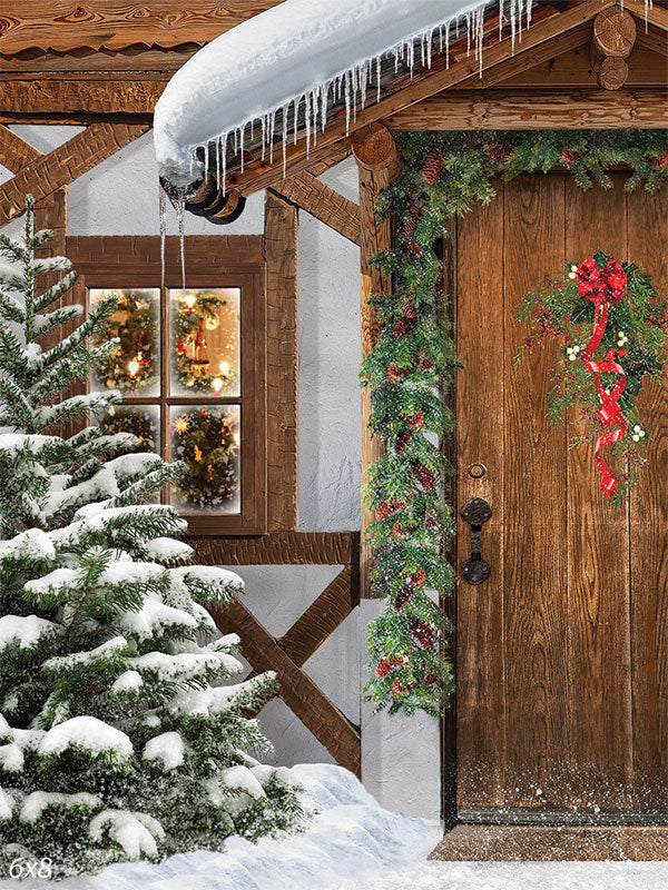 Cozy Winter Cottage Door Photography Backdrop - Photography backdrop featuring a cozy winter cottage door with holiday wreath, garland, and snow-covered scenery.