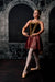 A moody and sophisticated photography backdrop featuring a deep, elegant Baroque arch with ornate flourishes, ideal for high-fashion and cinematic photography.