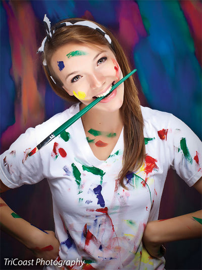 Spectrum of brushstroke colors ranging from emerald to gold on dark base.