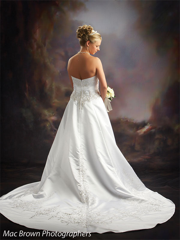 Storybook-style backdrop with dreamy woodland setting.