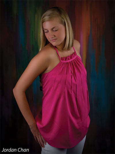 Painterly design with energetic hues in a chaotic, expressive pattern.