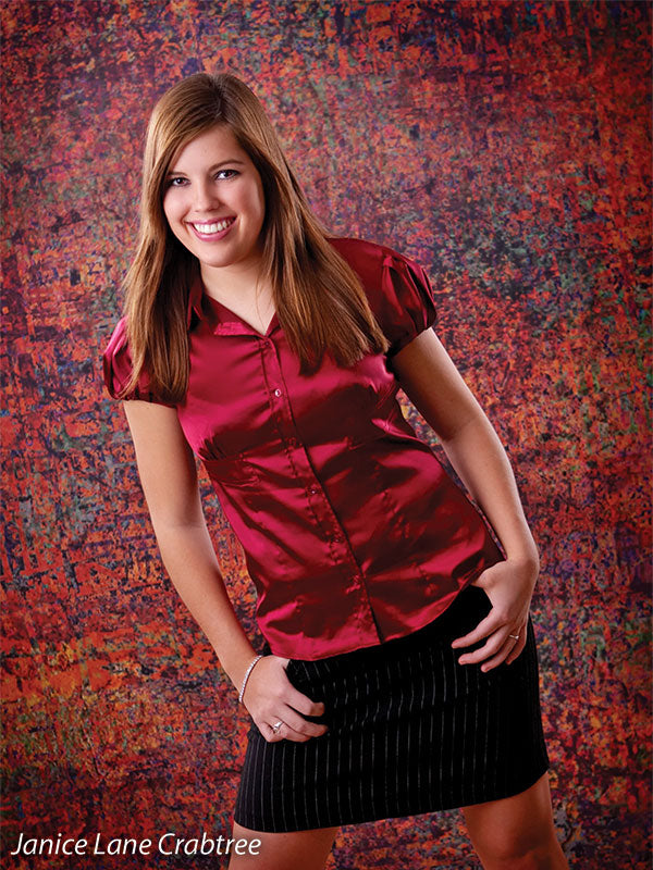 Abstract composition with glitch-like patterns and rich rust and plum colors.