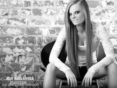 Authentic aged brick photography backdrop with natural wear.