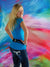Soft dreamy swirl design with artistic brush movement in vivid hues.