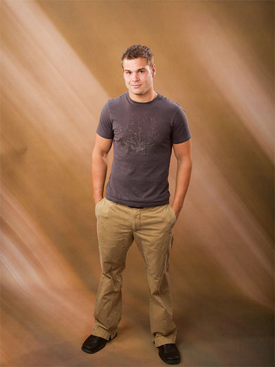 Subtle textured backdrop in earthy hues ideal for timeless, refined photography.