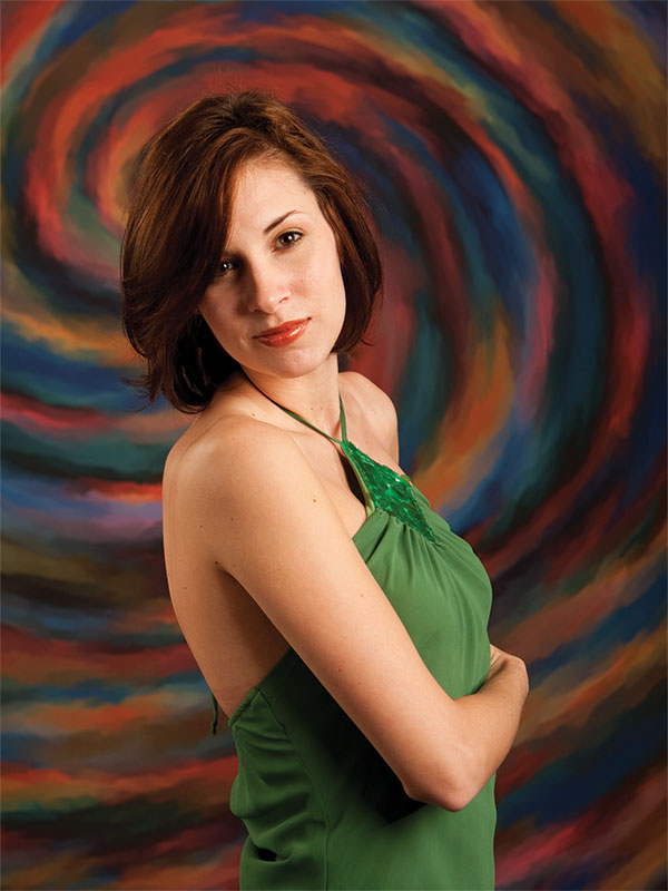 High-energy color swirl with dramatic contrast and painterly movement.