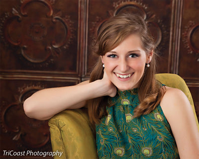Studio photography backdrop featuring aged copper tile embossing.
