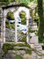 Enchanted Forest Ruins Photography Backdrop - Photography backdrop featuring moss-covered stone ruins and a waterfall framed by a gothic window, perfect for whimsical and nature-themed shoots.