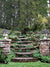 Enchanted Stone Staircase Photography Backdrop - Enchanted stone staircase surrounded by lush greenery and stone pillars, perfect for whimsical and magical-themed photoshoots.