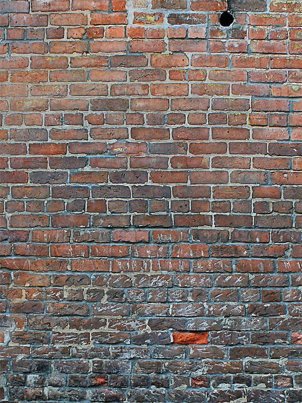 Vintage red and gray brick backdrop with weathered textures.