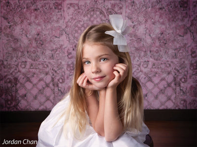 Soft pink distressed backdrop ideal for timeless portrait sessions.