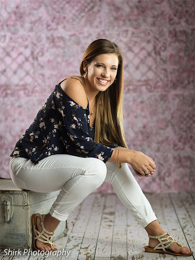 Romantic distressed pink backdrop for timeless photography sessions.