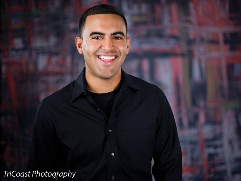 Edgy fashion photography backdrop with strong red and black contrasts.
