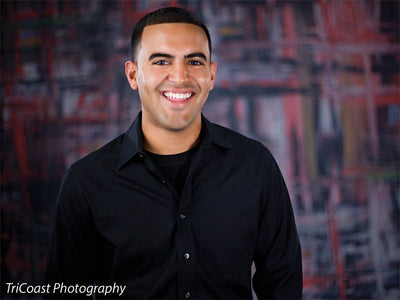 Edgy fashion photography backdrop with strong red and black contrasts.