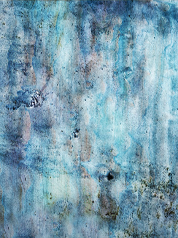 Weathered blue backdrop with mottled texture and soft neutral undertones.