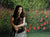 Ideal spring studio background with bold floral row and dense hedge.