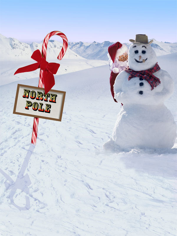 Snowy mountain scene with snowman and North Pole candy cane sign.