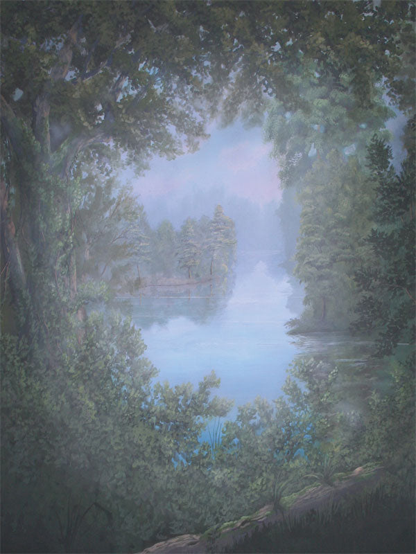A misty forest backdrop featuring a calm lake surrounded by dense greenery.