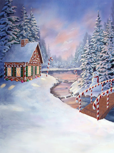 A snowy holiday backdrop with a whimsical gingerbread house surrounded by candy decorations and winter trees.